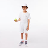 SHORT JUNIOR BLANC LACOSTE TENNIS EN TAFFETAS DIAMANTÉ 2